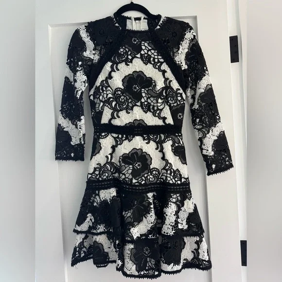 Alexis Lace Black and White never worn dress Alexis Lace Black and White never worn dress